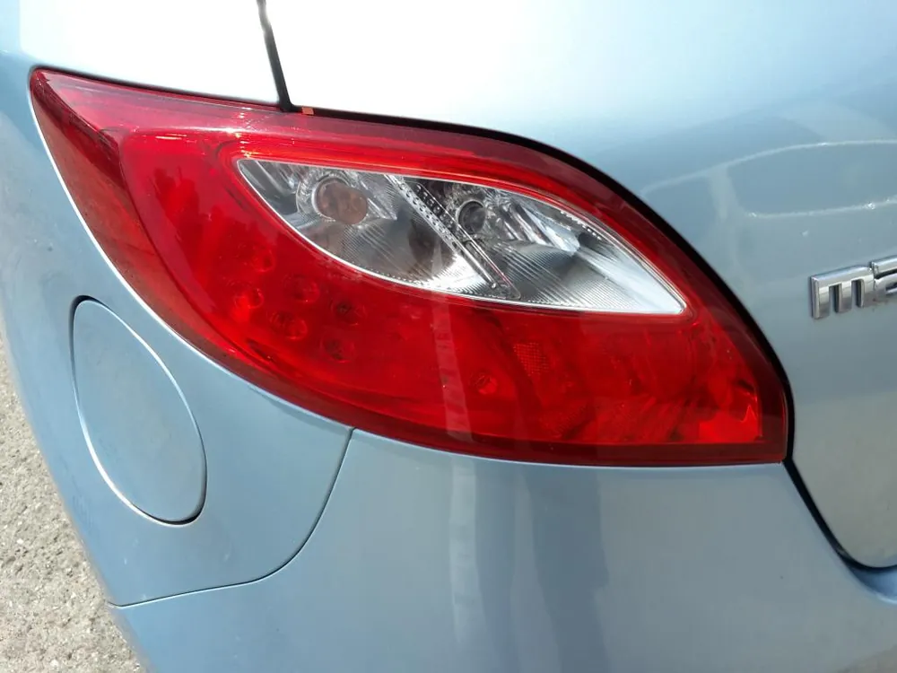 Scheinwerfer, Leuchten gebraucht MAZDA 2 (DE) Baujahr 2010 Finale Aktion